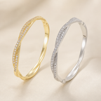 Élan Twist Armreif in goldfarbener und silberfarbener Variante