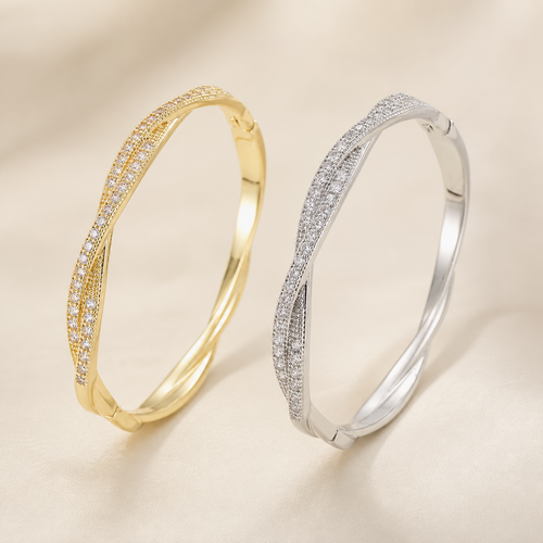 Élan Twist Armreif in goldfarbener und silberfarbener Variante